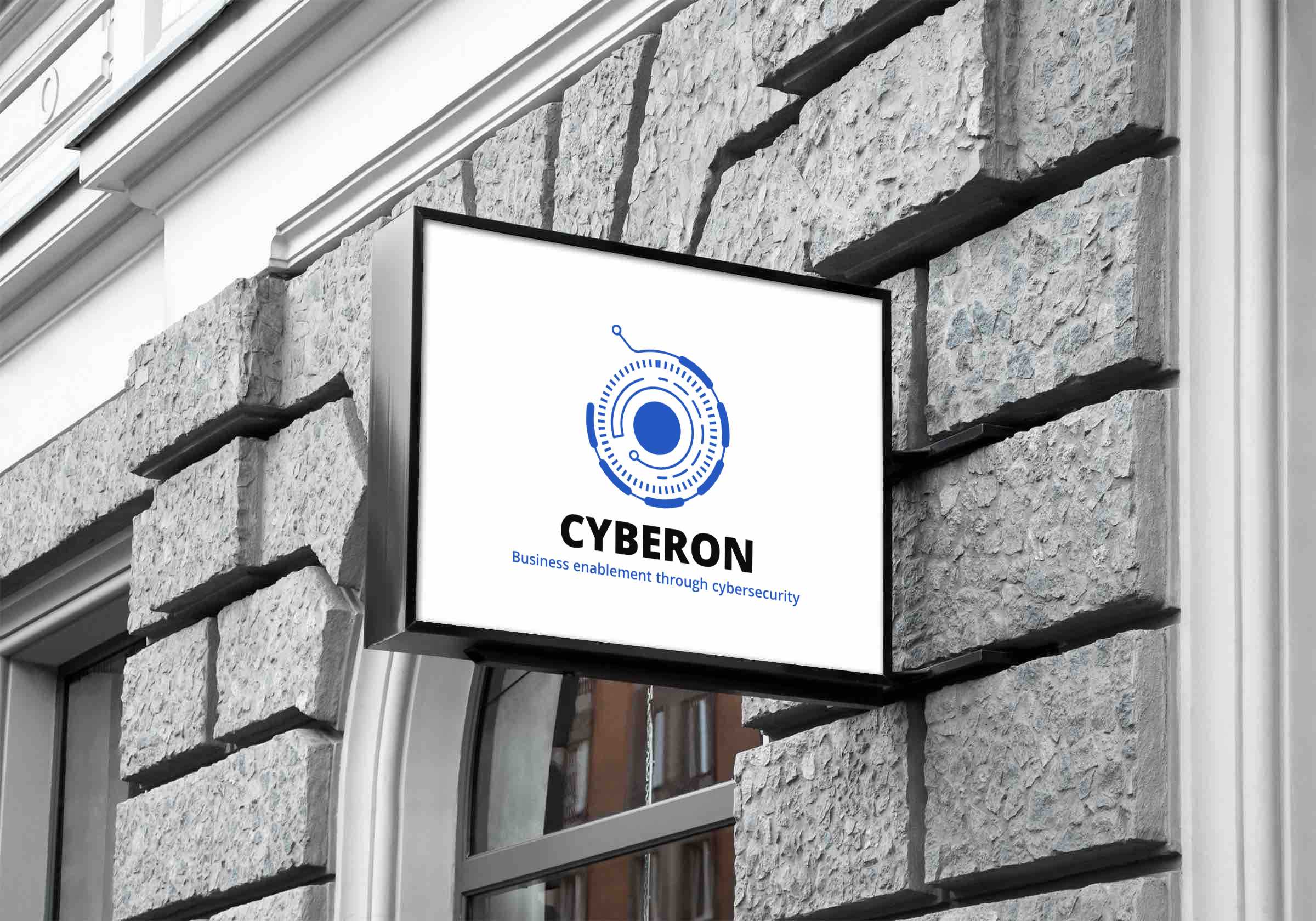 The Cyberon sign on a grey brick wall